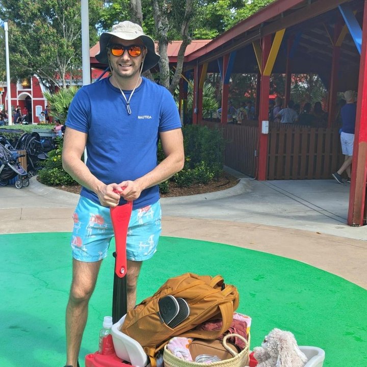 Raul Mendez at the park, wide-brim hat and sunglasses